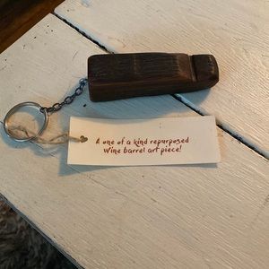 A one of a kind repurposed wine barrel piece key chain